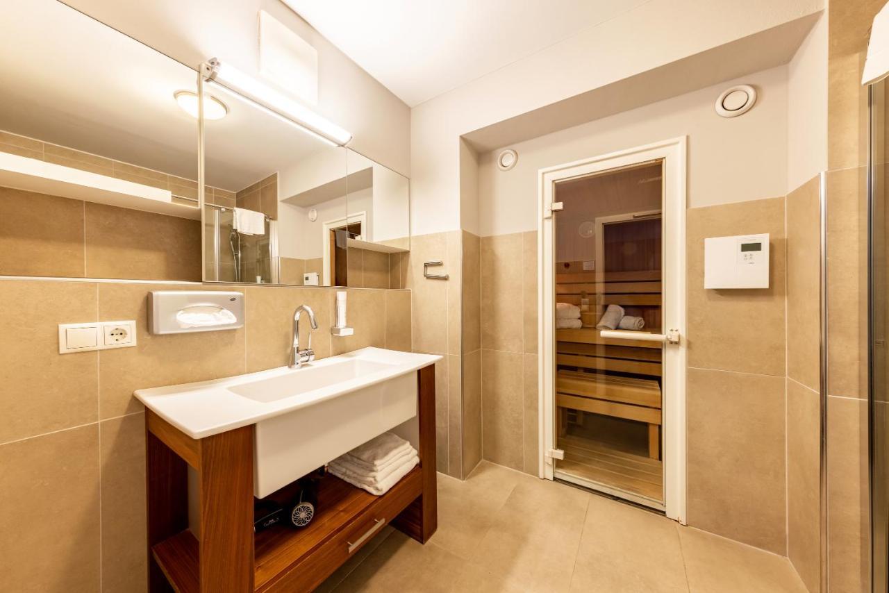 Der Sonnberg Alpinlodges - Apartments Mit Seeblick, Privater Sauna Und Self Check-In 滨湖采尔 外观 照片